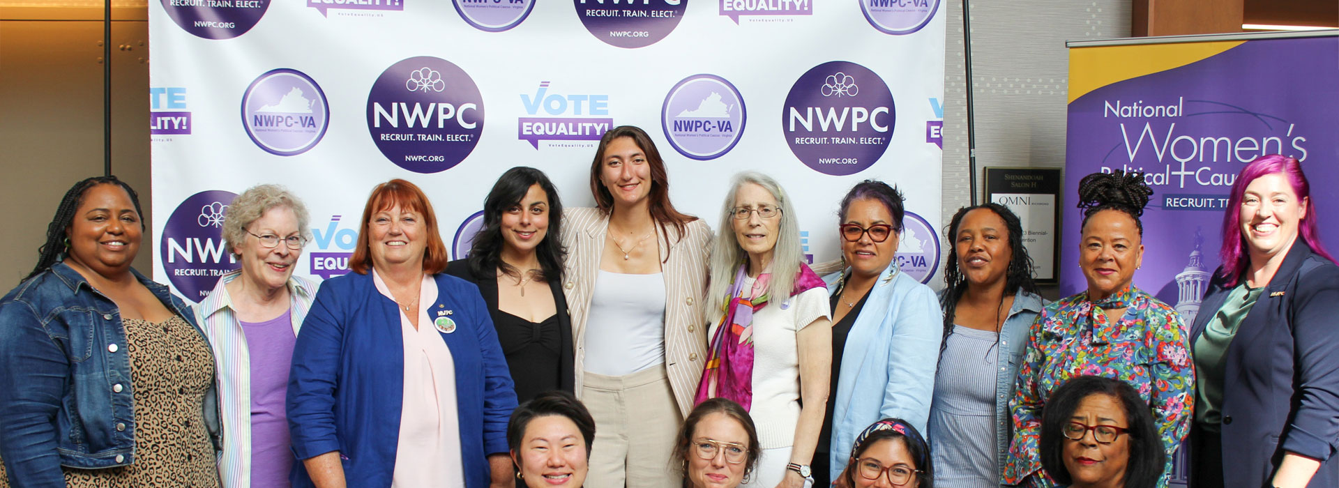 women at nwpc meeting - donate